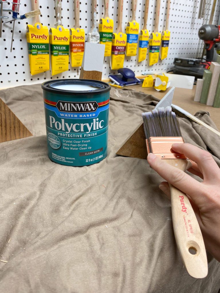 Applying polycrylic protective finish to mountain bookends
