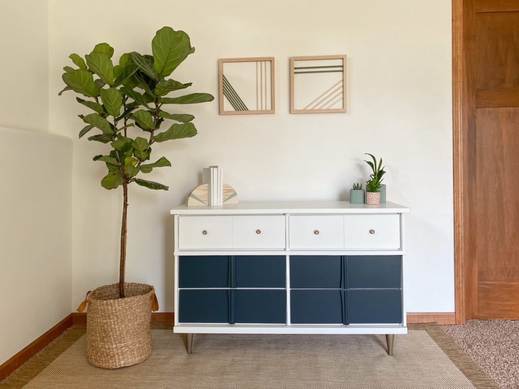 Refinished blue and white dresser with brushed gold legs and hardware