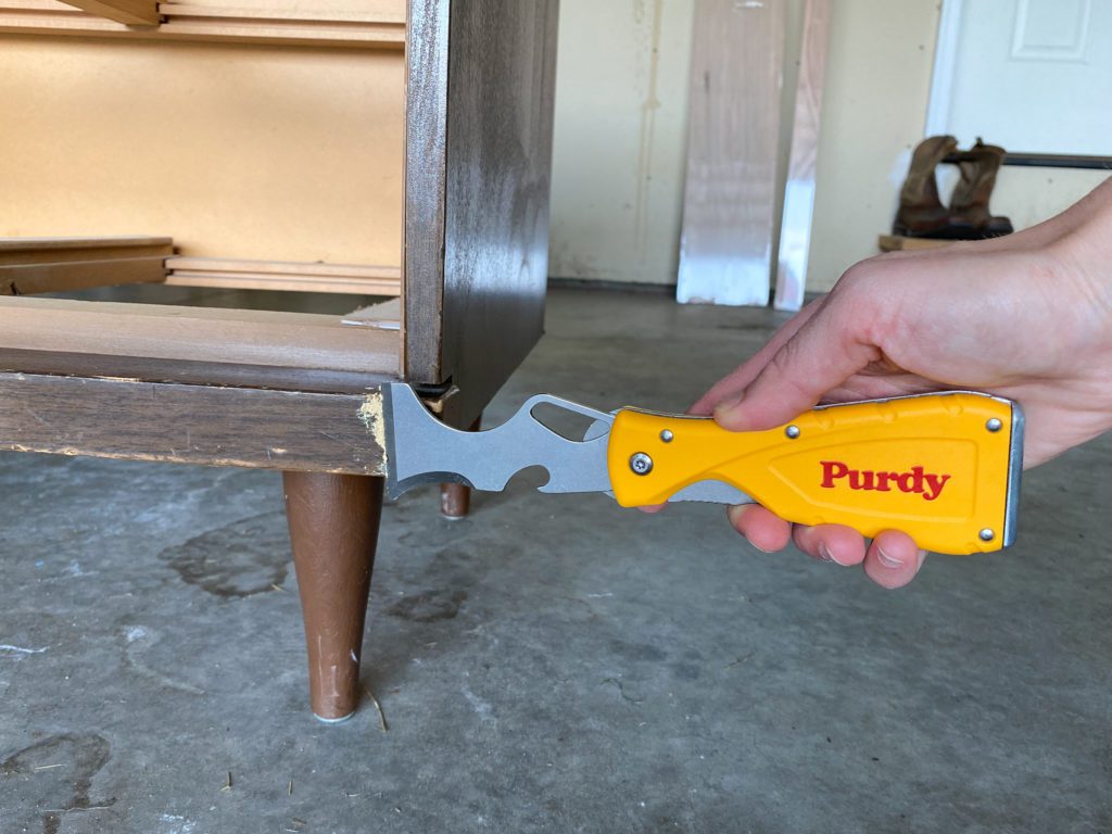 get a smooth finish when painting furniture by filling imperfections with wood filler